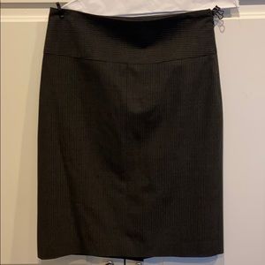 A knee length Black and Gray Skirt